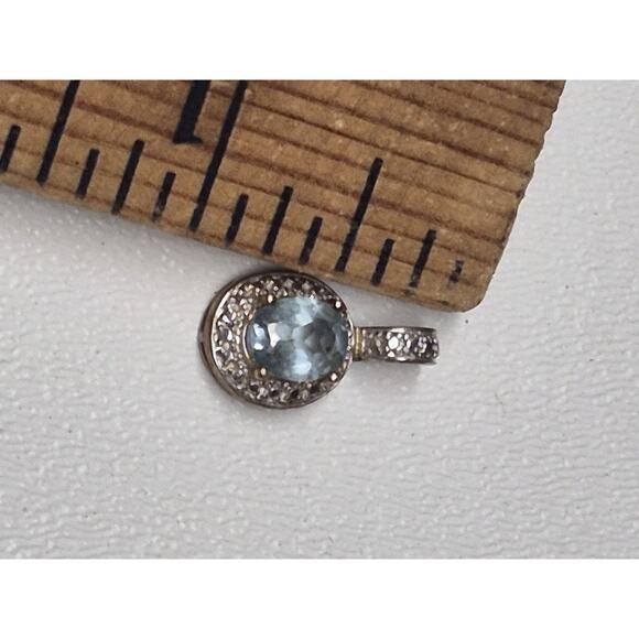 Blue Stone Surrounded by White Stones Set in Silver Pendant - Picture 2 of 3